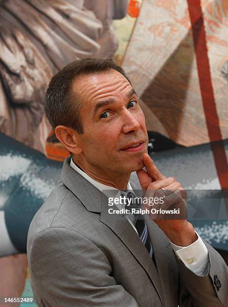 Artist Jeff Koons poses in front of a segment of his art work 'Antiquity 3, 2011' during the opening of the exhibition 'Jeff Koons. The Painter & The...