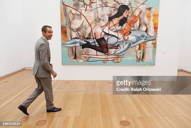 Artist Jeff Koons arrives for a photo call in front of his art work 'Antiquity 3, 2011' during the opening of the exhibition 'Jeff Koons. The Painter...