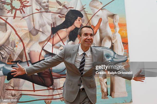 Artist Jeff Koons poses in front of his art work 'Antiquity 3, 2011' during the opening of the exhibition 'Jeff Koons. The Painter & The Sculptor' at...