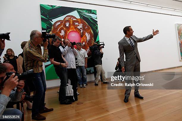 Artist Jeff Koons gestures during the opening of the exhibition 'Jeff Koons. The Painter & The Sculptor' at the Schirn Kunsthalle on June 19, 2012 in...