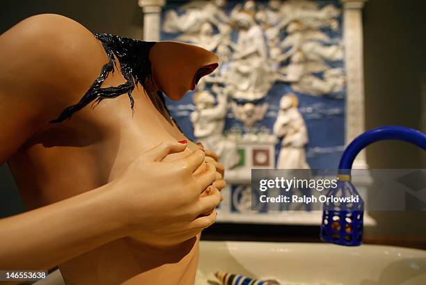 The art work 'Woman In Tub' of artist Jeff Koons is displayed during the opening of the exhibition 'Jeff Koons. The Painter & The Sculptor' at the...