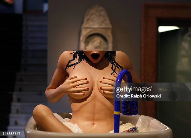 The art work 'Woman In Tub' of artist Jeff Koons is displayed during the opening of the exhibition 'Jeff Koons. The Painter & The Sculptor' at the...