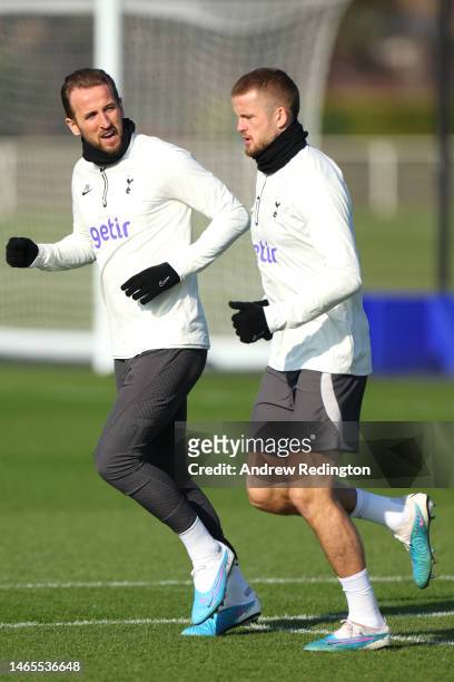 Harry Kane and Eric Dier of Tottenham Hotspur talk during a training session ahead of their UEFA Champions League round of 16 match against AC Milan...