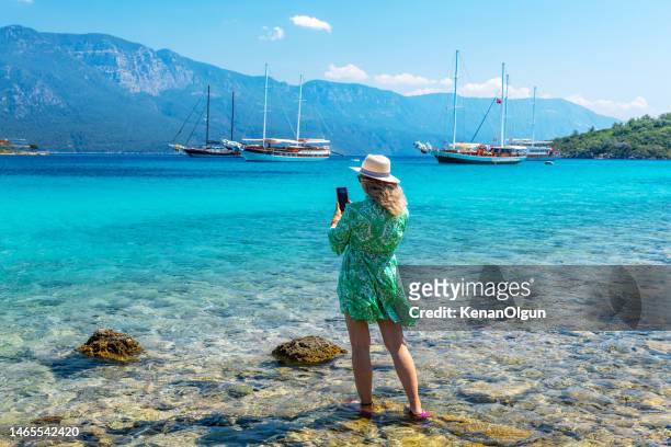 female tourist on sedir island in marmaris district of mugla province in turkey. - marmaris stock pictures, royalty-free photos & images