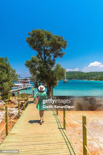female tourist on sedir island in marmaris district of mugla province in turkey. - marmaris stock pictures, royalty-free photos & images