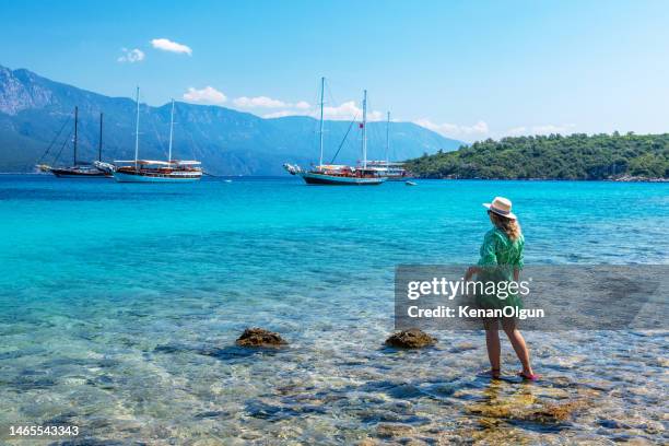 female tourist on sedir island in marmaris district of mugla province in turkey. - marmaris stock pictures, royalty-free photos & images