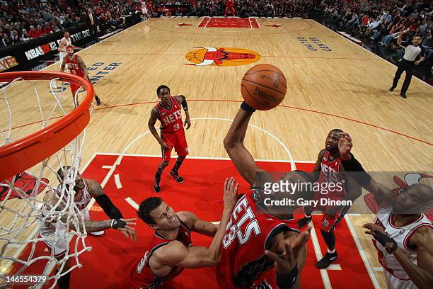 Sheldon Williams of the New Jersey Nets goes for a dunk against the Chicago Bulls during the game on February 18, 2012 at the United Center in...