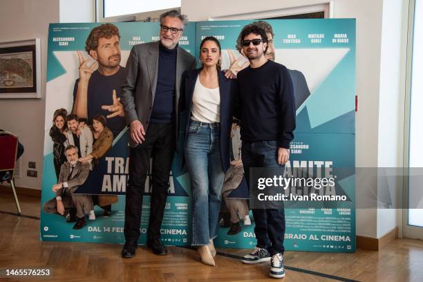 Max Tortora, Matilde Gioli and Alessandro Siani attend the "Tramite Amicizia" photocall on February 13, 2023 in Naples, Italy.