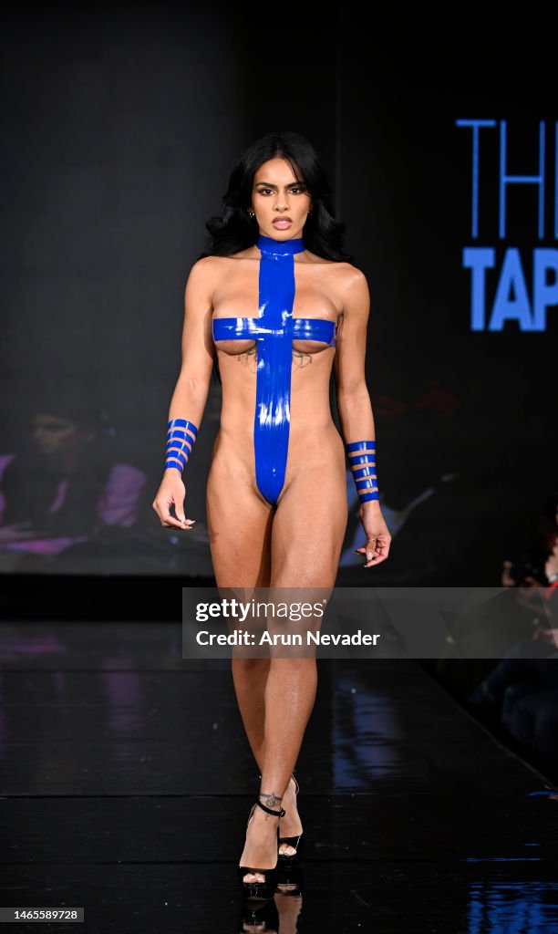 A model walks the runway wearing Black Tape Project during New York