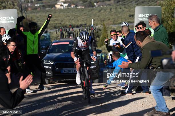 Tadej Pogacar of Slovenia and UAE Team Emirates competes in the breakaway on a gravel road compete while fans cheers during the 2nd Clasica Jaen...