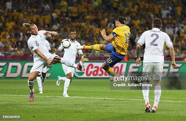 Zlatan Ibrahimovic of Sweden scores the opening goal during the UEFA EURO 2012 group D match between Sweden and France at The Olympic Stadium on June...