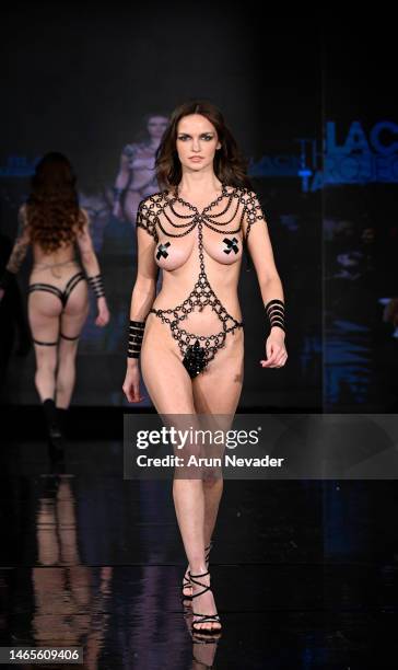Alexis Reed walks the runway wearing Black Tape Project during New York Fashion Week Powered by Art Hearts Fashion at The Angel Orensanz Foundation...