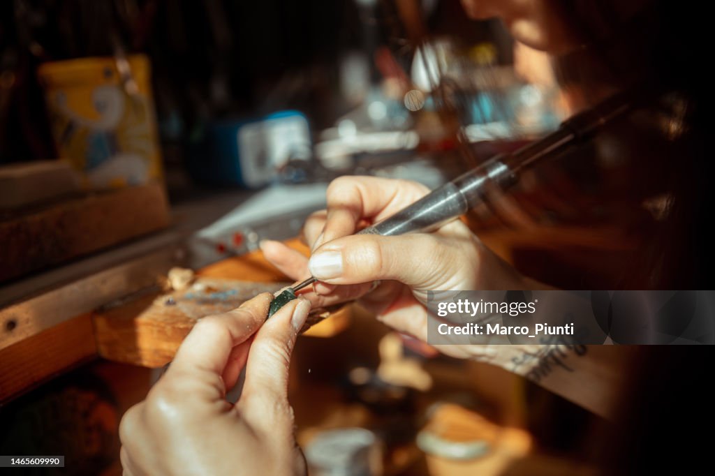 Woman jeweller working