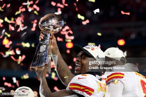 Jerick McKinnon of the Kansas City Chiefs celebrates with the the Vince Lombardi Trophy after defeating the Philadelphia Eagles 38-35 in Super Bowl...