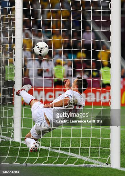John Terry of England clears an effort from Marko Devic of Ukraine off the line during the UEFA EURO 2012 group D match between England and Ukraine...