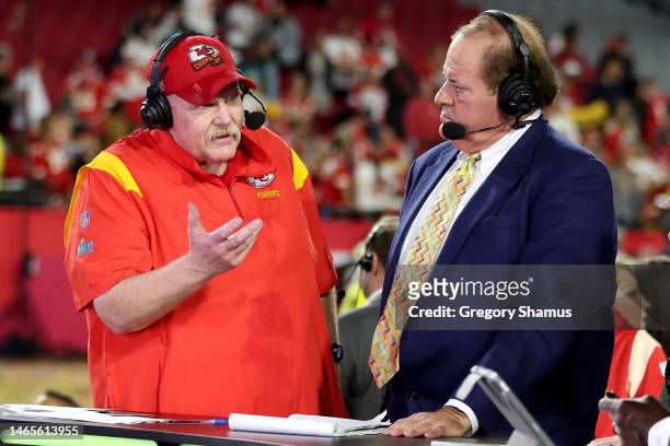 Head coach Andy Reid of the Kansas City Chiefs talks with sportscaster Chris Berman after defeating the Philadelphia Eagles 38-35 in Super Bowl LVII...