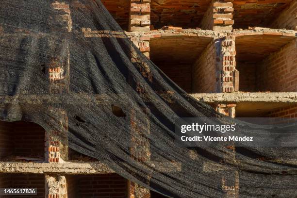 rehabilitation and construction of niches - tumba fotografías e imágenes de stock