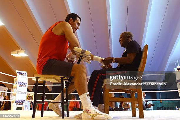 Head coach Emanuel Steward prepares Wladimir Klitschko of Ukraine for a training session at Hotel Stanglwirt on June 19, 2012 in Going, Austria....