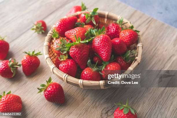 strawberry - bamboo fruit stock pictures, royalty-free photos & images
