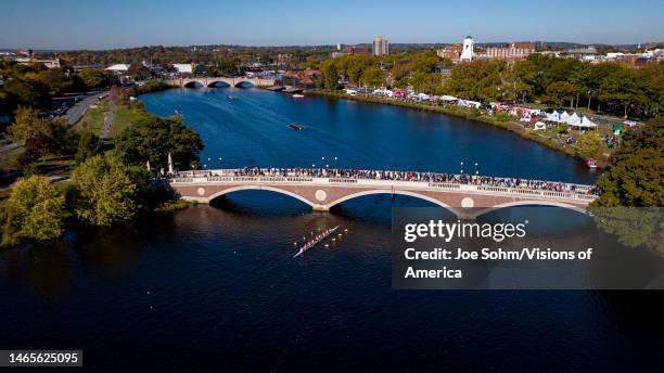 Aerial view of Head of the Charles, annual Rowing Contest on Charles River at Harvard in front of Weeks Bridge.