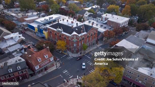 Aerial view of small Pennsylvania town over Main Street and shops.