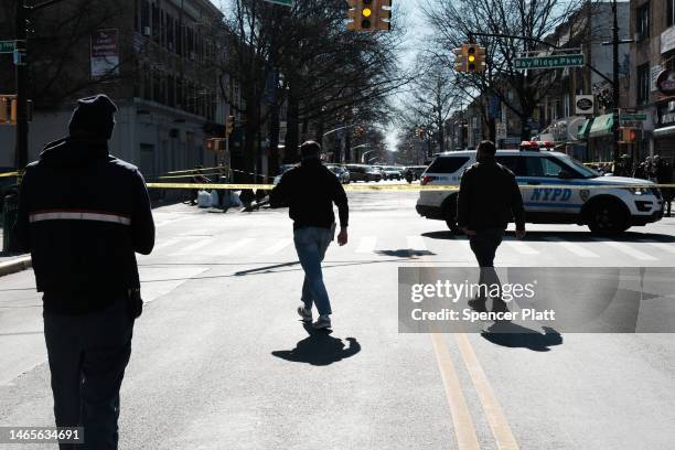 Police investigate at an intersection after a man driving a U-Haul truck struck several pedestrians in the Bay Ridge neighborhood in Brooklyn on...