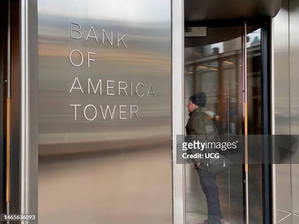 Man entering Bank of America Tower on 42nd street, Manhattan, New York.