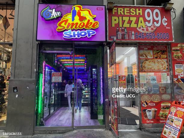 6th Avenue Smoke Shop and Fresh 99 cent Pizza, Manhattan, New York.