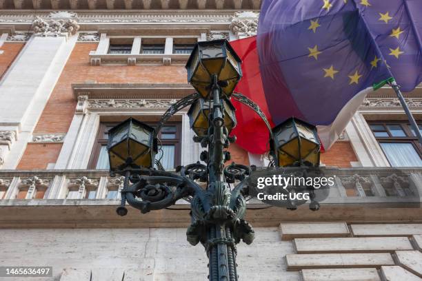 Palazzo Montecitorio. Chamber of Deputies of the Italian Republic, Camera dei Deputati, Italian Parliament. European and Italian flag. The building...