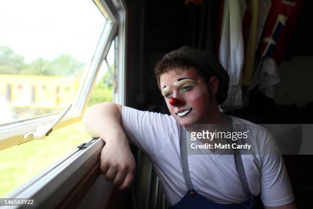 Gareth Ellis, who is Bippo the clown in Gerry Cottle's Circus: 50 Acts In 100 Minutes, prepares for his performance on June 19, 2012 in Shepton...