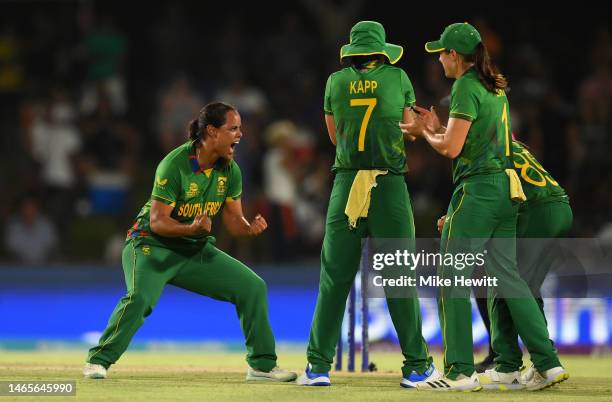 Chloe Tryon of South Africa celebrates the wicket of Sophie Devine of New Zealand during the ICC Women's T20 World Cup group A match between South...