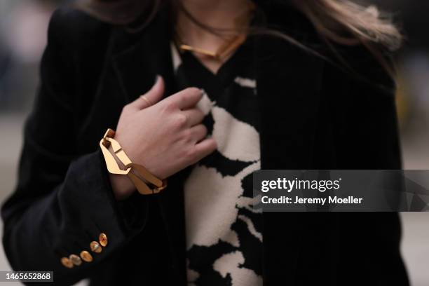 Lenia Perez wearing black / white patterned Vipop Set, gold VIPOP Necklace, gold Brazalete VIPOP, black velvet Schiaparelli jacket during the New...