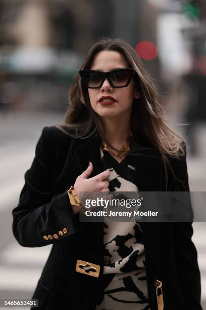 Lenia Perez wearing black shades, black / white patterned Vipop Set, gold VIPOP Necklace, gold Brazalete VIPOP, black velvet Schiaparelli jacket...