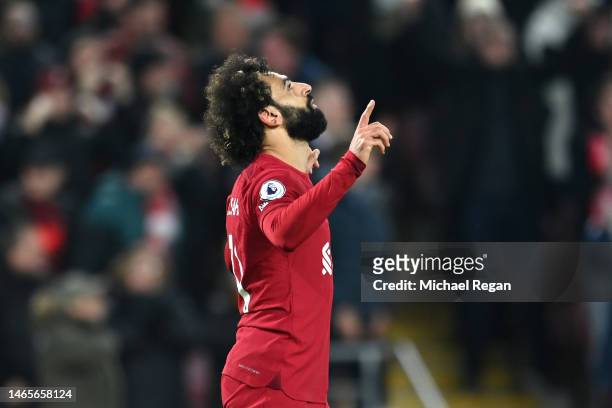 Mohamed Salah of Liverpool celebrates after scoring the team's first goal during the Premier League match between Liverpool FC and Everton FC at...