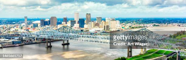 new orleans skyline - louisiana bridge stock pictures, royalty-free photos & images