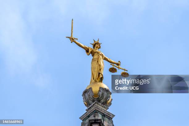 Statue of Lady Justice atop the Old Bailey Statue, London, UK.