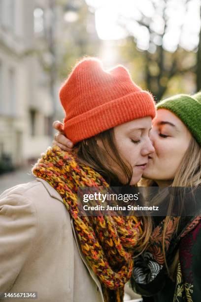 close up of tender moment between female couple - photos of lesbians kissing stock pictures, royalty-free photos & images