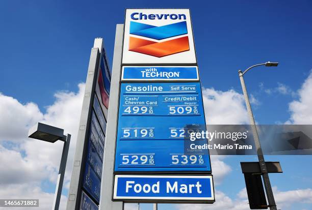 Gas prices are displayed at a Chevron gas station on February 13, 2023 in Los Angeles, California. January's Consumer Price Index will be released...