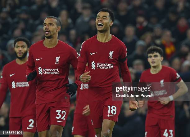 Cody Gakpo of Liverpool celebrates scoring the second goal during the Premier League match between Liverpool FC and Everton FC at Anfield on February...