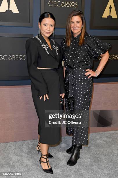 Domee Shi and Lindsey Collins attend the 95th Annual Oscars Nominees Luncheon at The Beverly Hilton on February 13, 2023 in Beverly Hills, California.