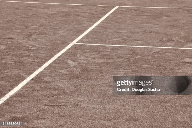 clay surface and painted lines for the tennis court - tennis ball on court stock pictures, royalty-free photos & images