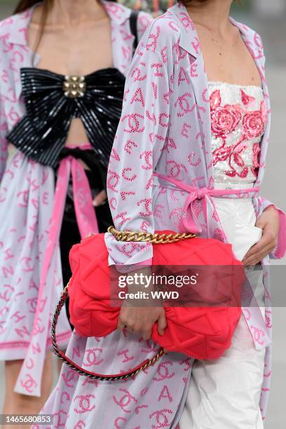 Model on the catwalk, bag detail