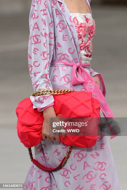 Model on the catwalk, bag detail