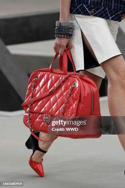 Model on the catwalk, bag detail