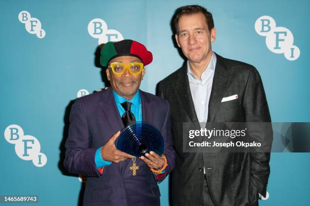Spike Lee and Clive Owen attend a photocall as Spike Lee receives BFI Fellowship at BFI Southbank on February 13, 2023 in London, England.