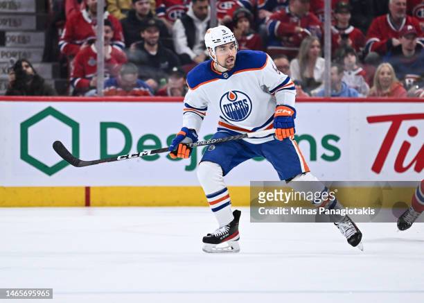 Cody Ceci of the Edmonton Oilers skates during the first period against the Montreal Canadiens at Centre Bell on February 12, 2023 in Montreal,...