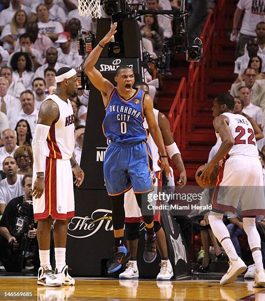 Oklahoma City Thunder's Russell Westbrook reacts after dunking the ball in the second quarter during Game 4 of the NBA Finals at the AmericanAirlines...
