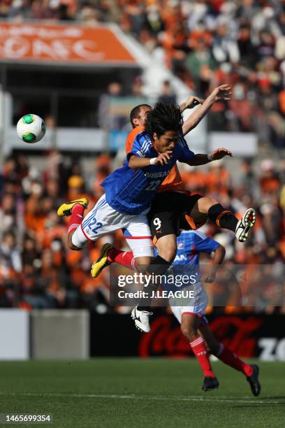 Yuji Nakazawa of Yokohama F.Marinos and Bare of Shimizu S-Pulse compete for the ball during the J.League J1 match between Shimizu S-Pulse and...