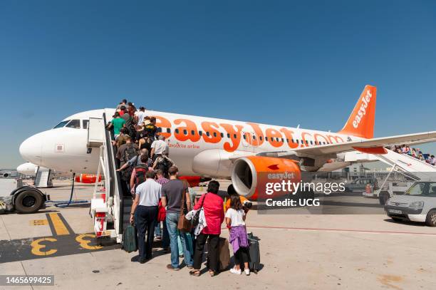 Passengers boarding Easyjet plane, Spain.