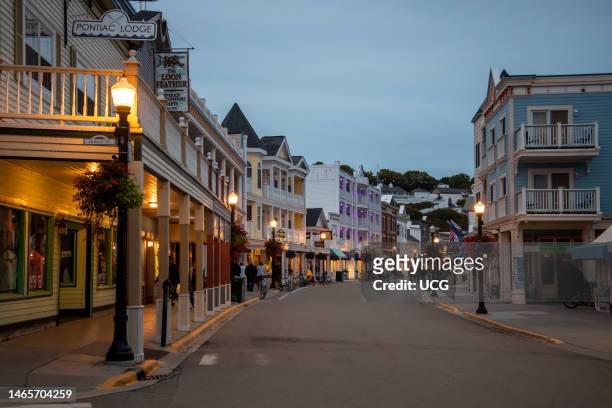 Mackinac Island, Michigan, Only horses and bicycles allowed on the island. Street scene of main street in downtown at night.